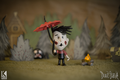 Wes collectable figurine and an Umbrella.