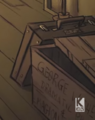 Closeup of Witherstone's monogrammed case and a crate from his business as seen in C'est La Vie.
