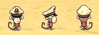 威尔伯戴着船长帽。